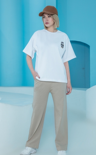 ست زنانه تیشرت گلدوزی شده ماکان و شلوار دمپا آزاد ماکان